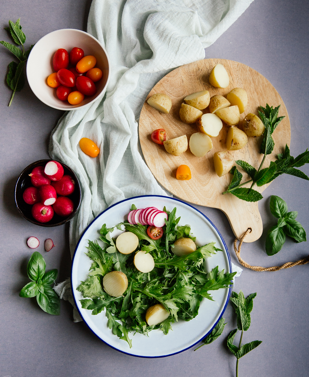 Summer potato salad with bresaola, tomatoes, radishes & avocado