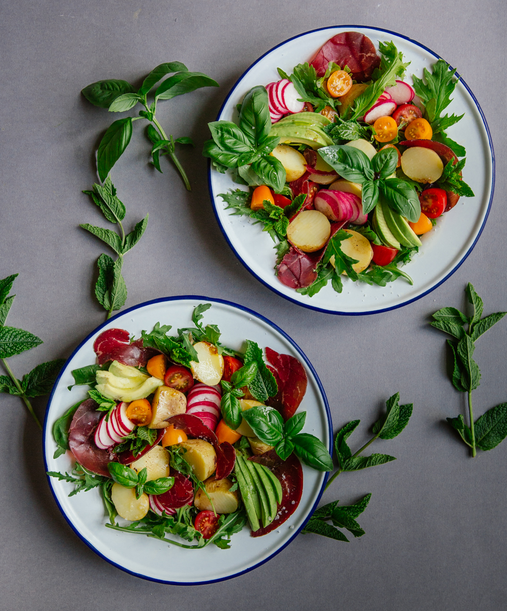 Summer potato salad with bresaola, tomatoes, radishes & avocado