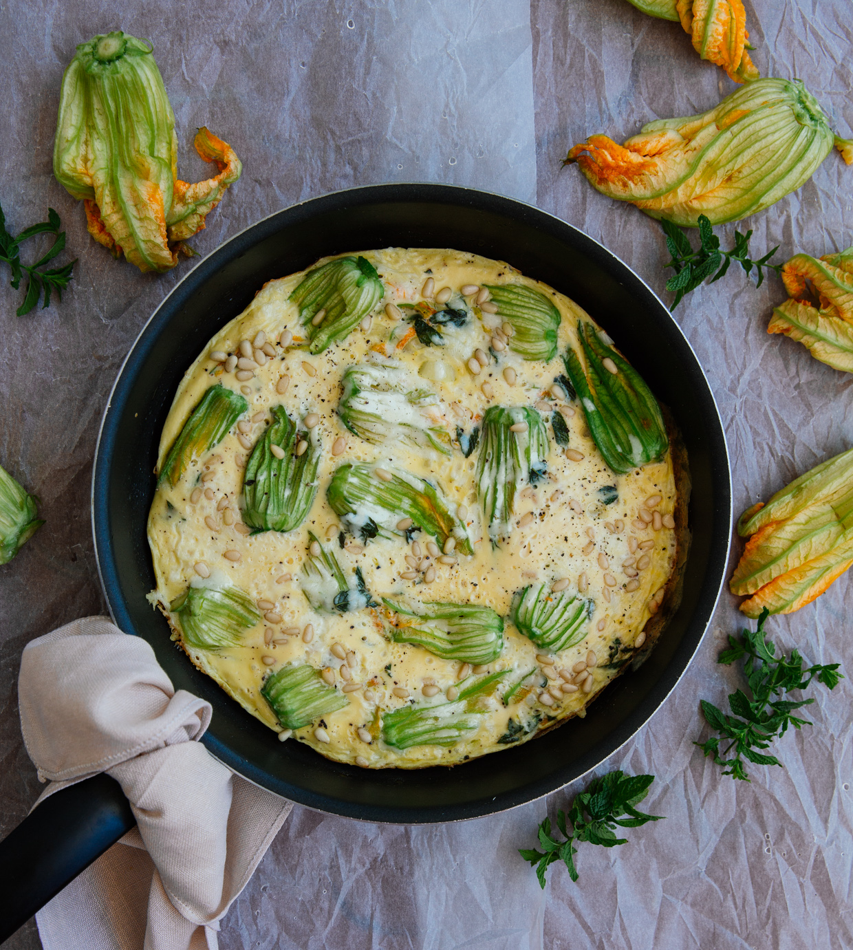 Courgette flower & pine nut omelette