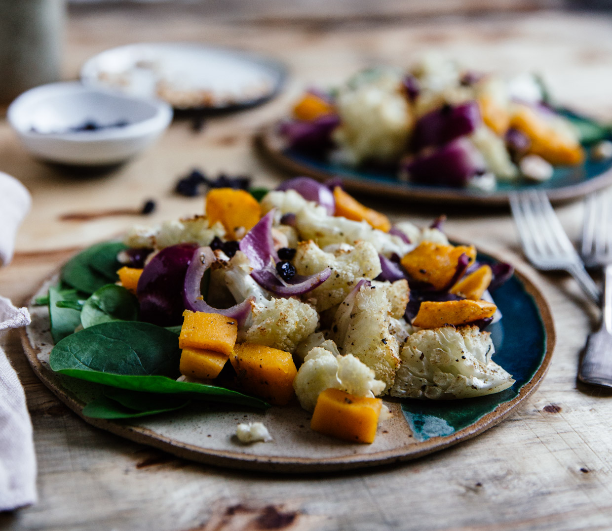 Cauliflower, spinach & hazelnut salad with peanut butter dressing