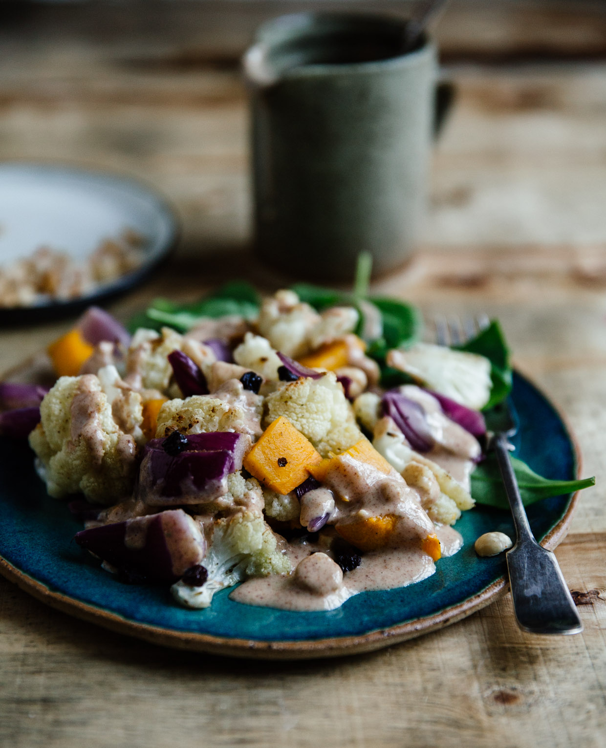 Cauliflower, spinach & hazelnut salad with peanut butter dressing