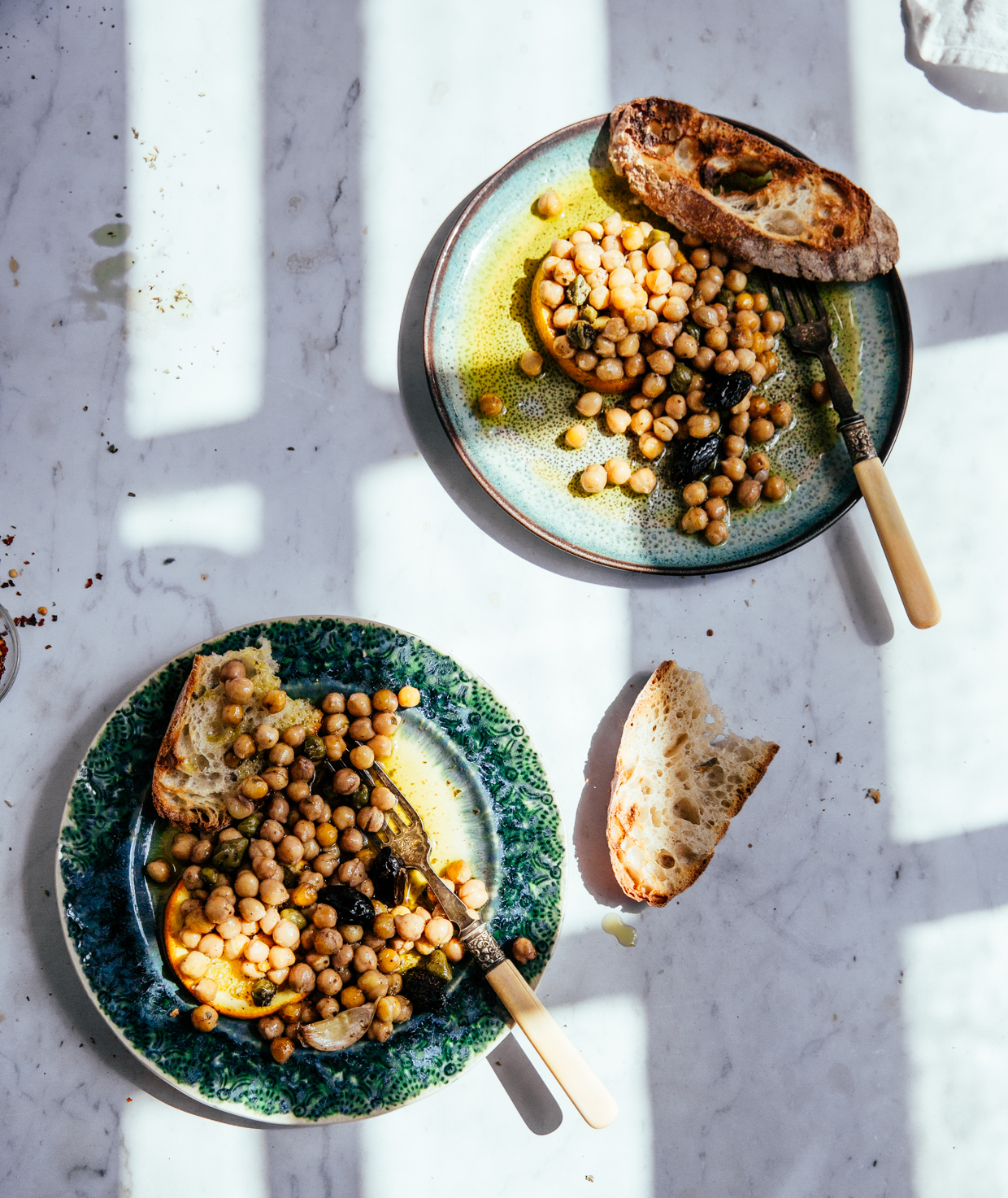 Baked chickpeas with capers, olives & orange