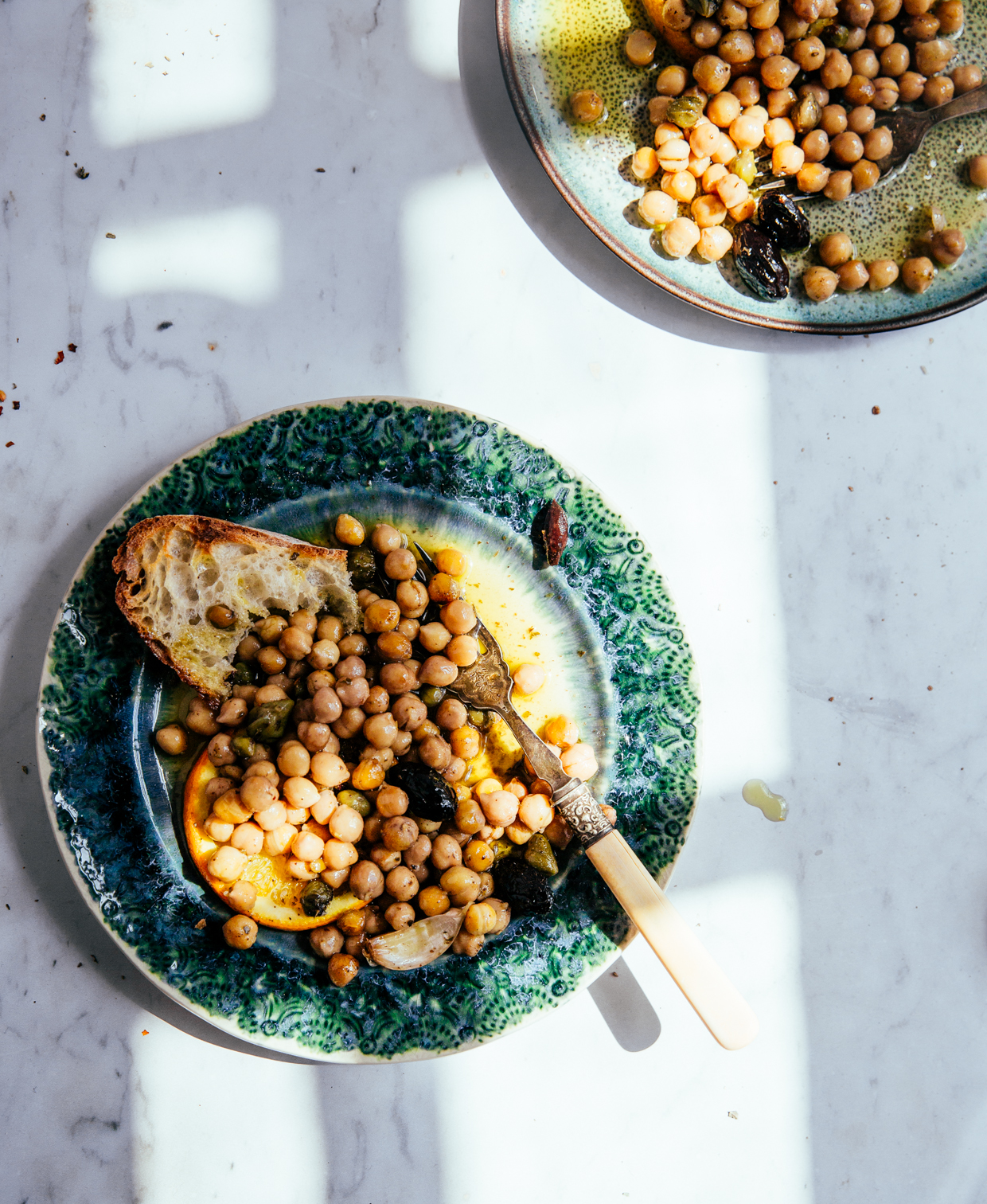 Baked chickpeas with capers, olives & orange