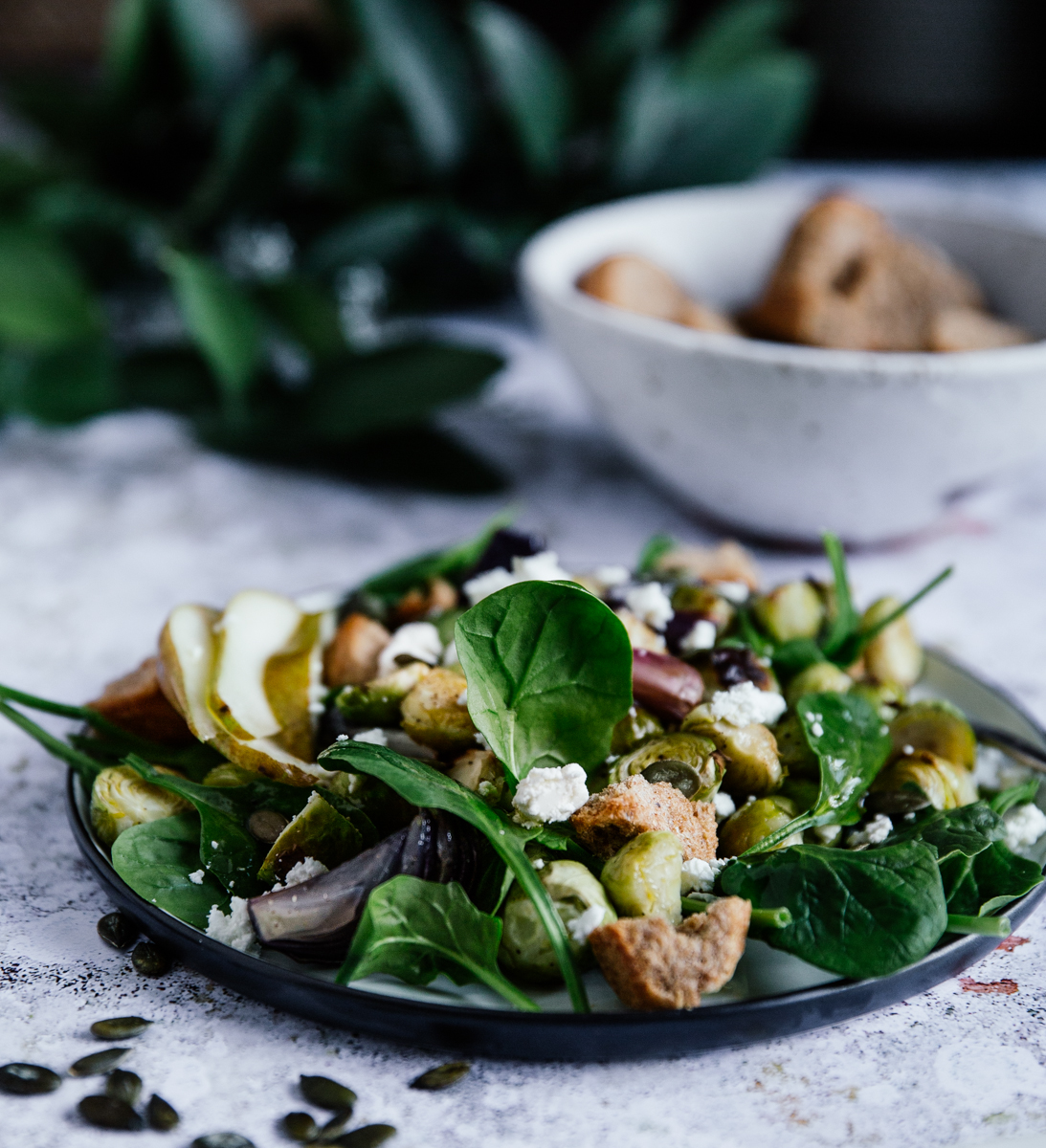 Brussels sprouts, pear & spinach salad with feta & croutons