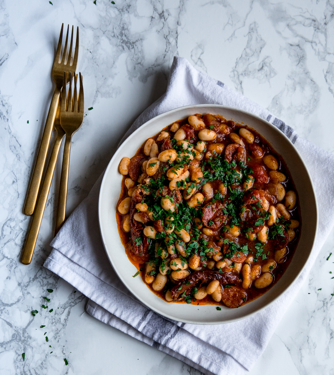 Baked beans with harissa, chorizo & sun dried tomatoes