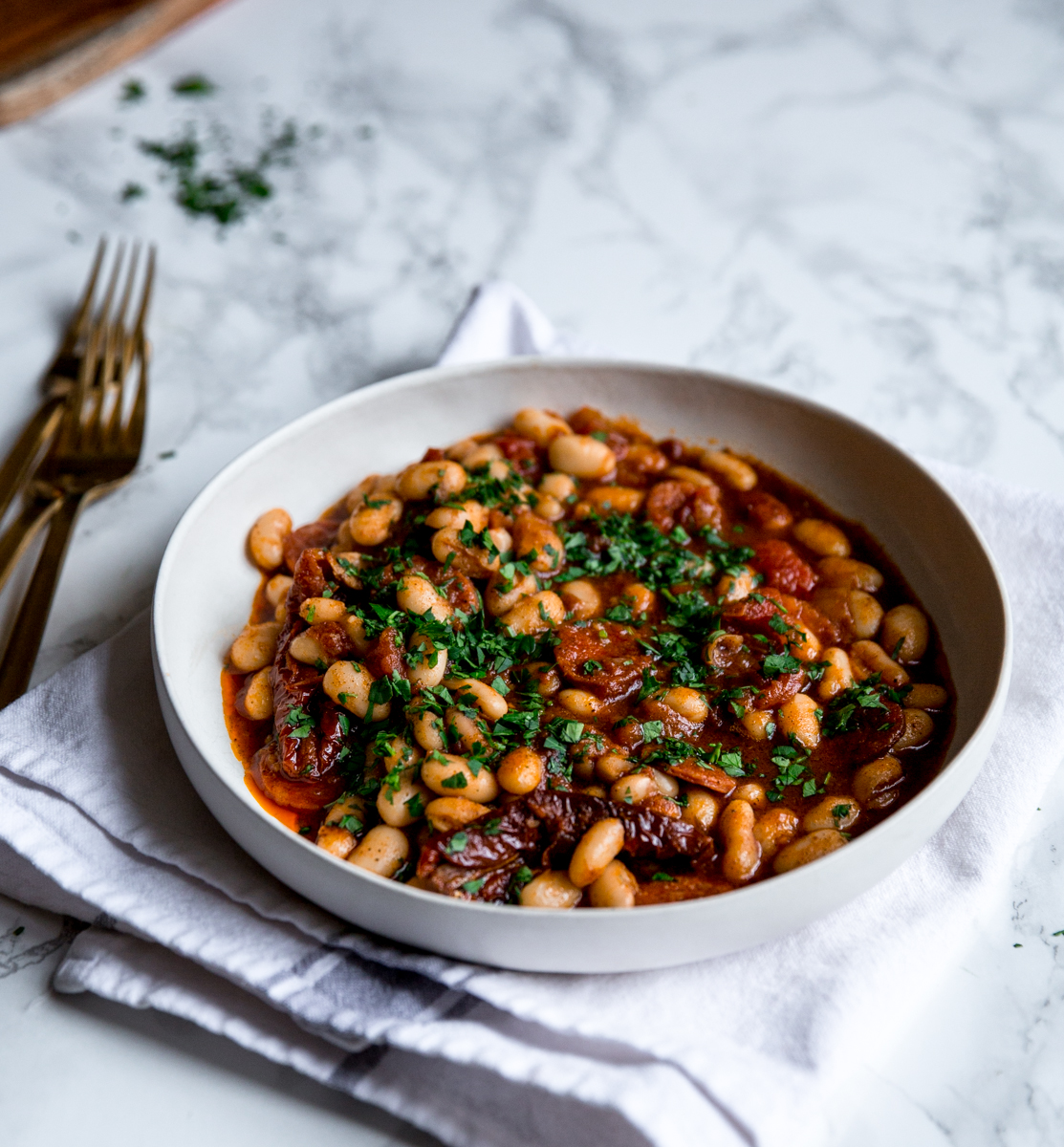 Baked beans with harissa, chorizo & sun dried tomatoes