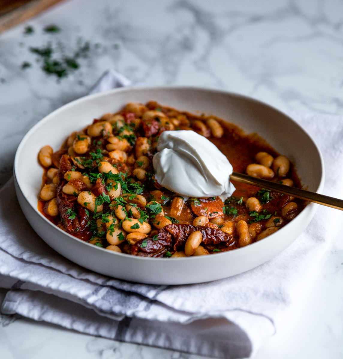 Baked beans with harissa, chorizo & sun dried tomatoes